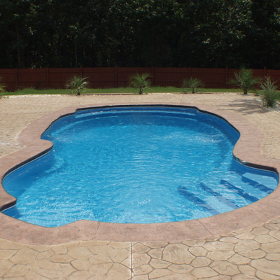 stamped concrete decking options for your fiberglass pool