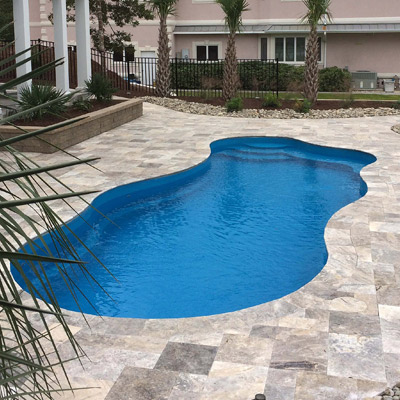 travertine decking options for your fiberglass pool